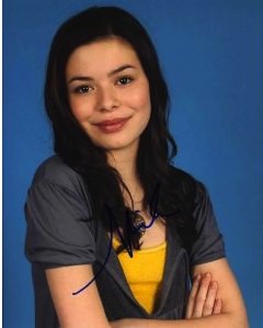 An autograph of Miranda Cosgrove / iCarly on a photograph of her
